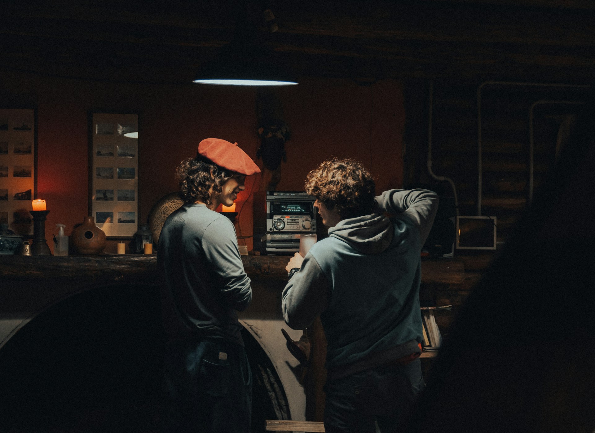 A group of people listening to a speaker at the start of an event.